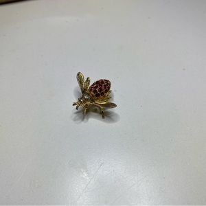Gold bee pin with red stones, costume jewelry, missing one stone